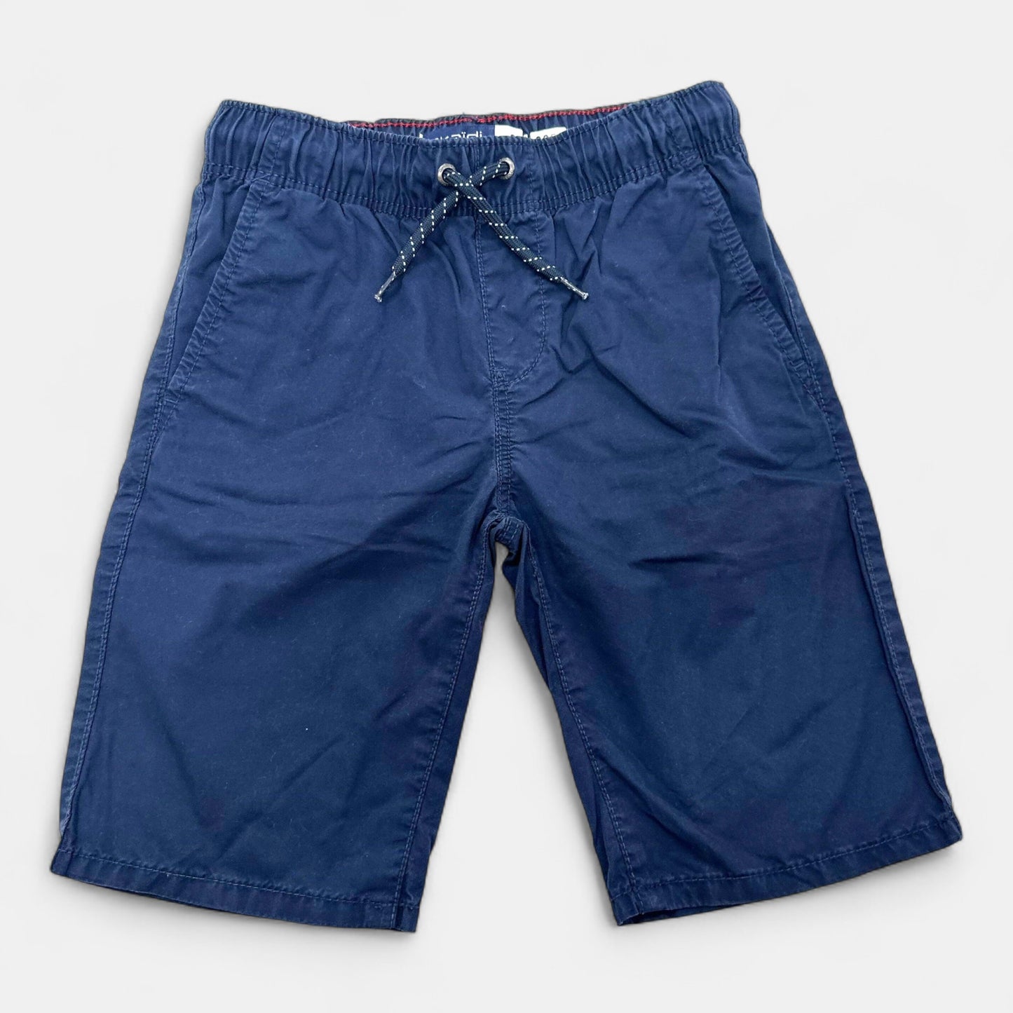 Short Okaïdi : 9 ans