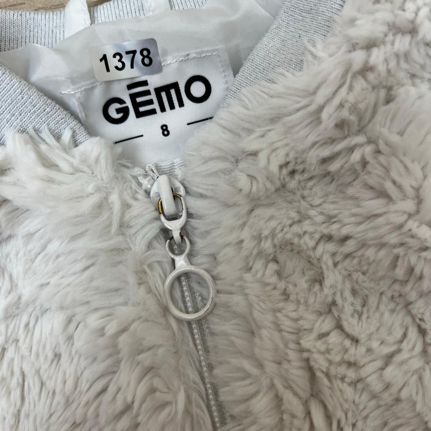 Gilet Gémo : 8 ans