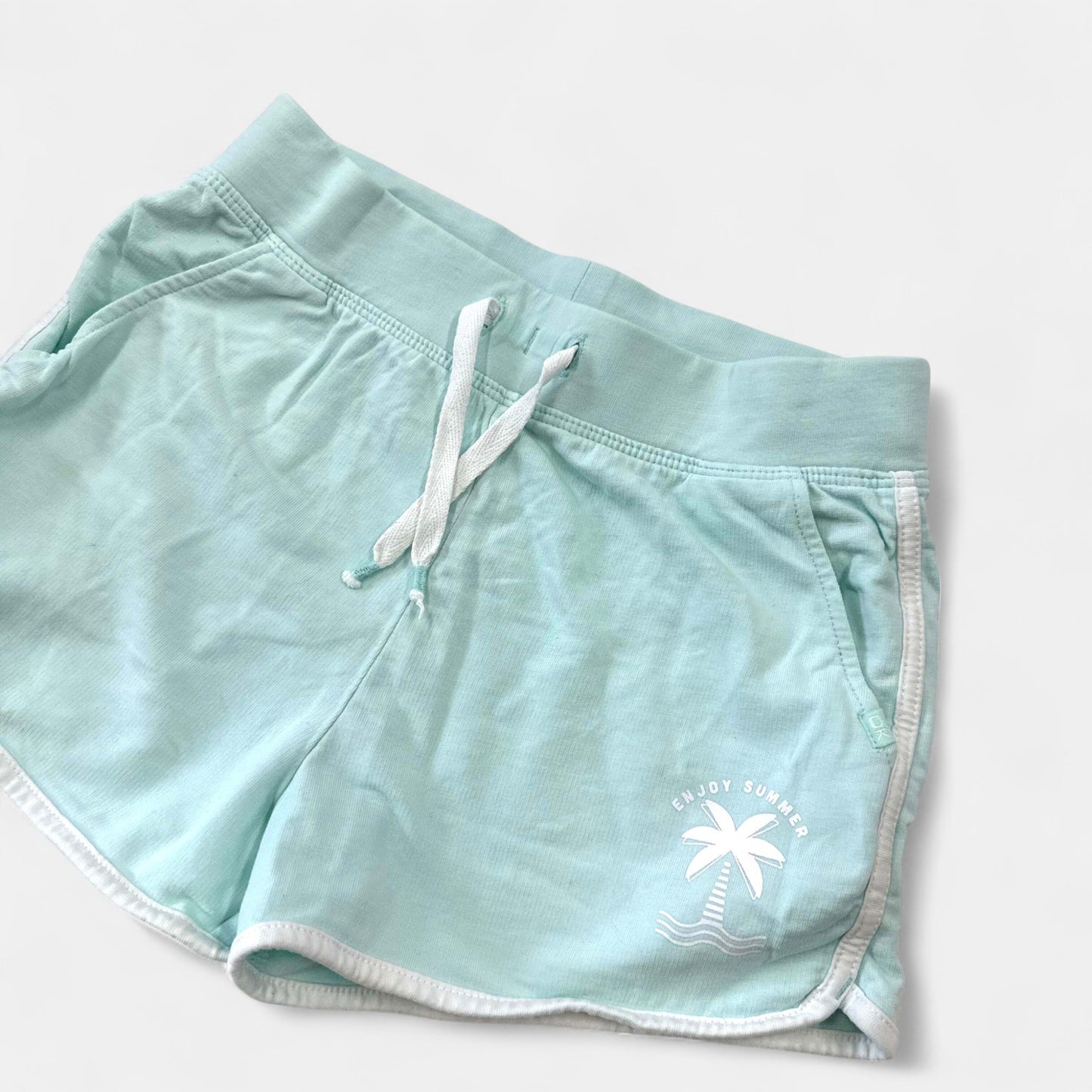 Short Okaïdi : 8 ans