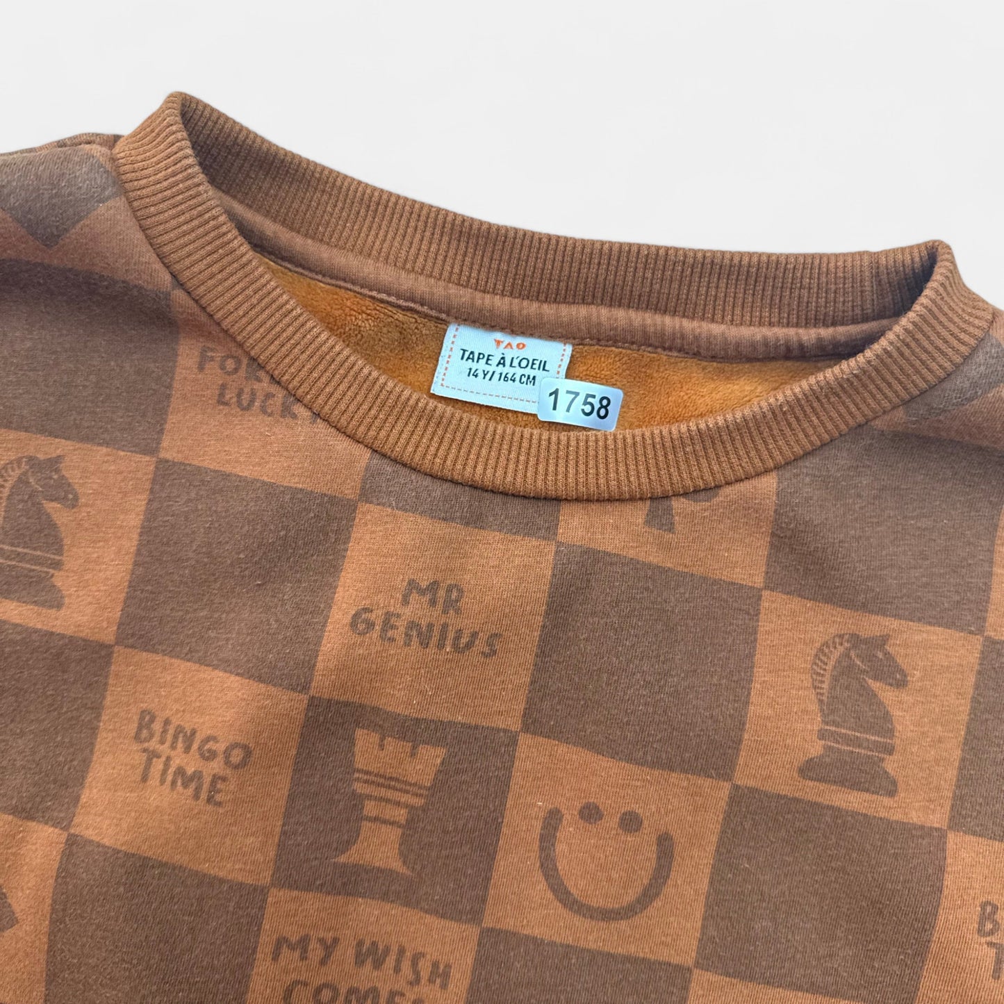 Pull Tape à l'oeil : 14 ans