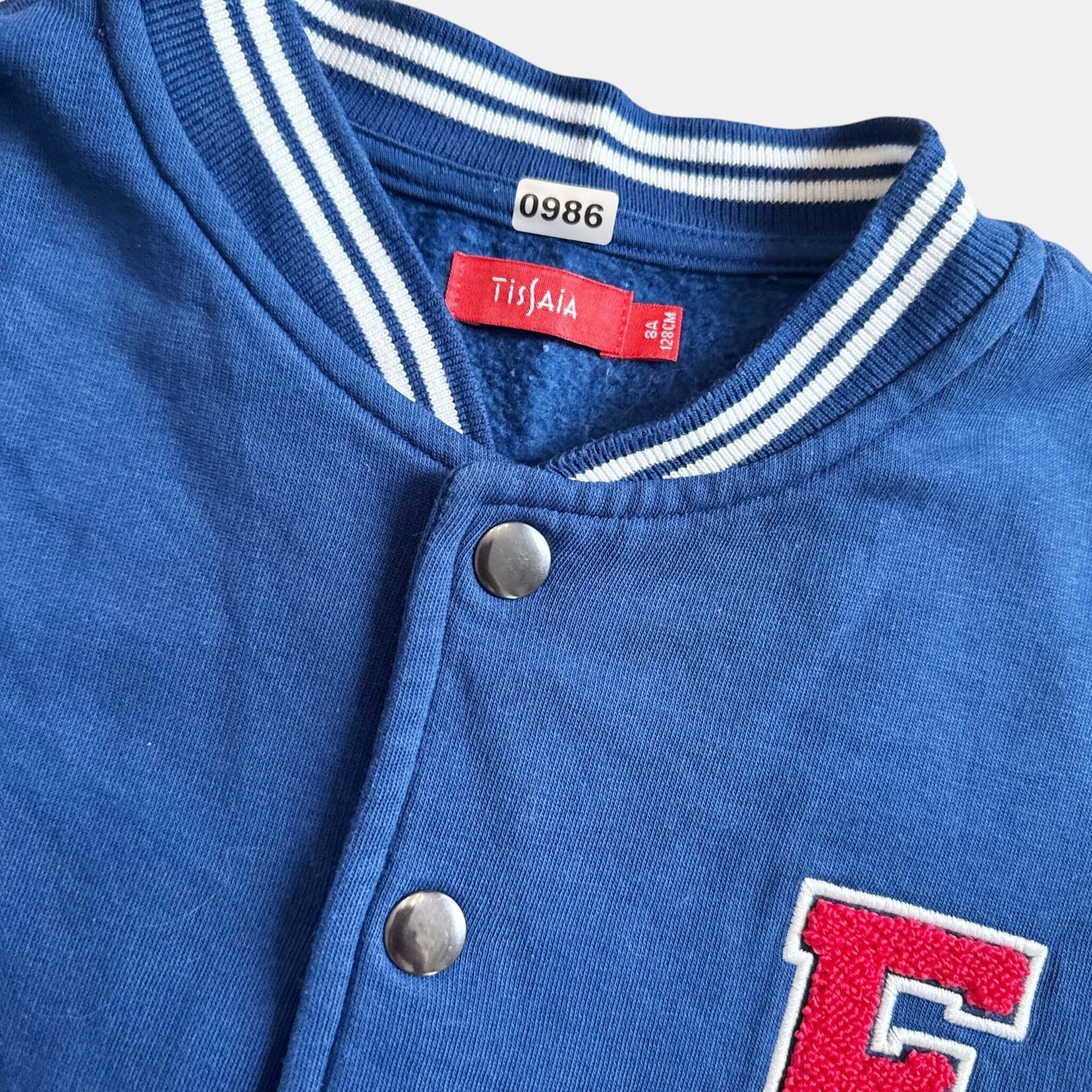 Veste / Manteau Tissaia : 8 ans