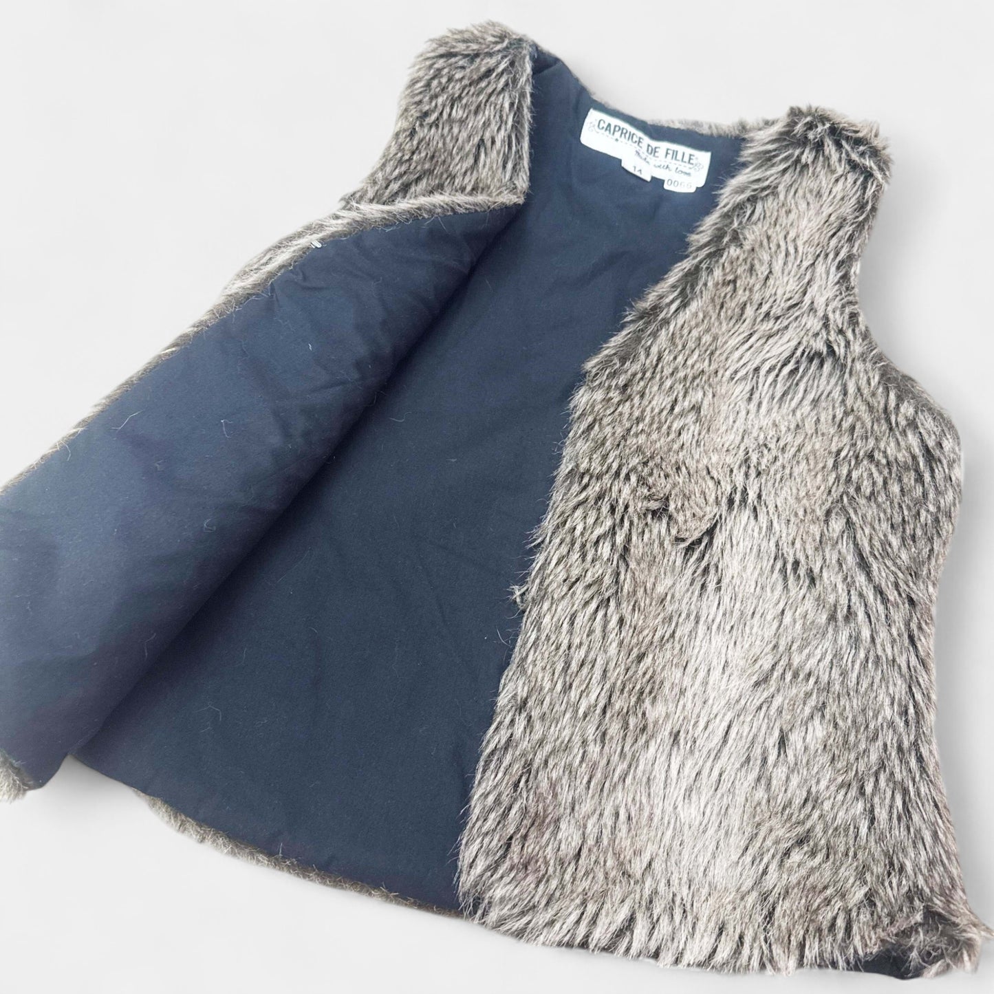 Gilet poil caprice de fille : 14 ans